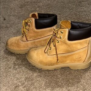 Boys Timberlands GUC plenty of good use left.